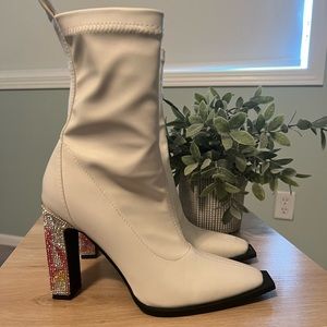 White boots with rhinestone heel